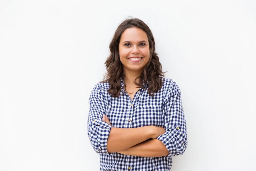 happy-joyful-woman-with-arms-folded-looking